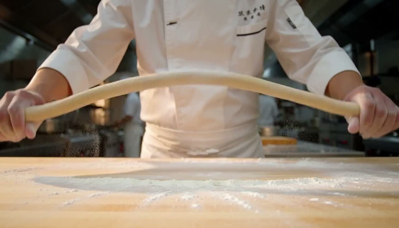 Shot 1: pulling the dough